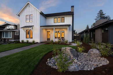 Example of a farmhouse exterior home design in Other