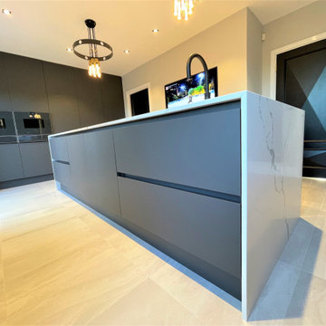 Graphite Satin Feel Breakfasting Kitchen with Oak Accent and Wall Hung Media