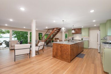 Inspiration for a contemporary light wood floor living room remodel in Minneapolis with white walls