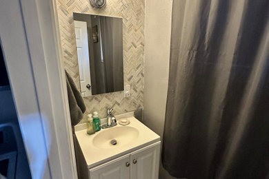 Example of a minimalist powder room design in Other
