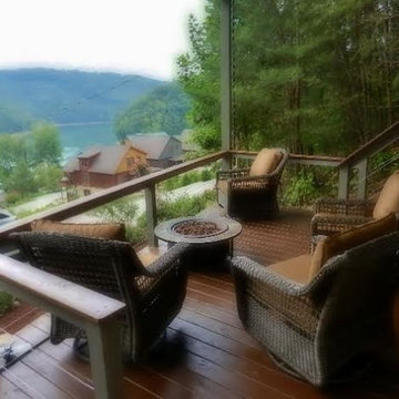 Two level deck on slope in the woods; lower level