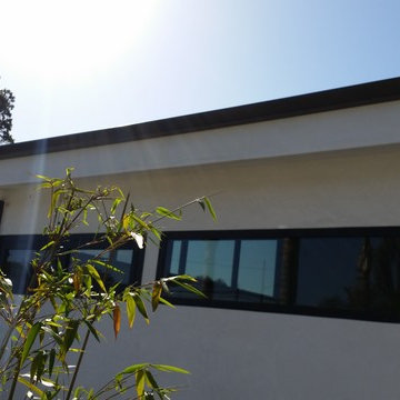 Costa Mesa, New Modern Home. Angle Face 5 inch Gutters, Smooth Downspouts.