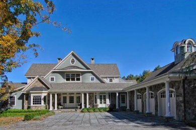 Large traditional blue two-story mixed siding gable roof idea in Boston