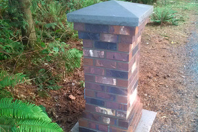 This is an example of a mid-sized traditional backyard landscaping in Seattle.