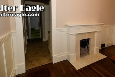 Inspiration for a mid-sized craftsman medium tone wood floor kitchen/dining room combo remodel in San Francisco with beige walls and a standard fireplace
