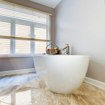 Elegant Master Bathroom Remodel with Quartz-Granite Hybrid Vanity and Spa Shower