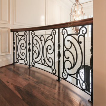 Project #74 | Circular Staircase with Hand-Forged Metal Panels