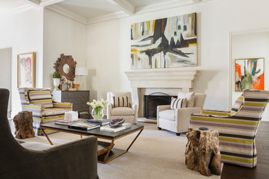 Inspiration for a transitional medium tone wood floor and brown floor living room remodel in Little Rock with white walls and a standard fireplace