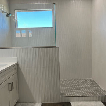 White Guest Bathroom & Master Suite Remodel Featuring 3D Tile
