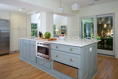 Kitchen - contemporary medium tone wood floor kitchen idea in DC Metro with shaker cabinets and an island