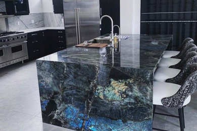 Eat-in kitchen - large modern eat-in kitchen idea in Dallas with quartzite countertops, white backsplash, stone slab backsplash, an island and blue countertops