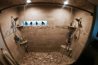 Inspiration for a large mediterranean master beige tile and stone tile travertine floor bathroom remodel in Phoenix