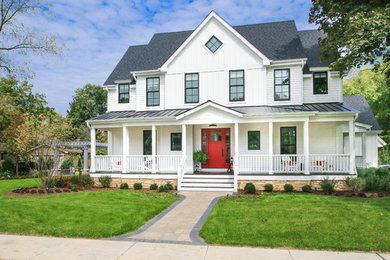 Mid-sized farmhouse white two-story mixed siding exterior home idea in Chicago with a shingle roof