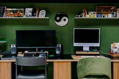 Example of an eclectic home office design in Other