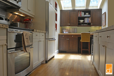 Example of a transitional kitchen design in Toronto