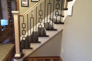 Inspiration for a mid-sized timeless wooden l-shaped staircase remodel in Other with painted risers