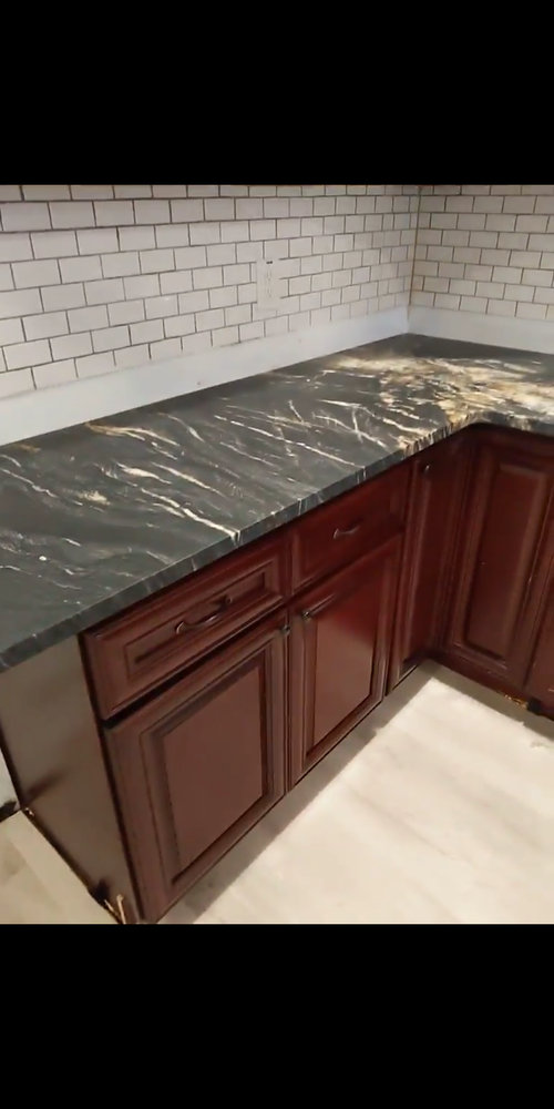 How to tile over existing backsplash and cover old countertop gap