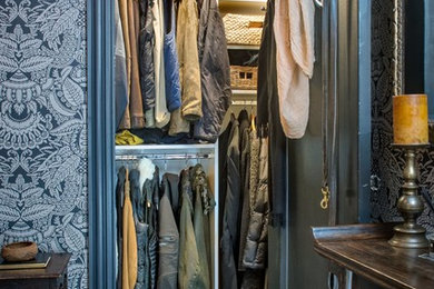 Inspiration for a small eclectic gender-neutral medium tone wood floor reach-in closet remodel in Orange County with open cabinets and white cabinets