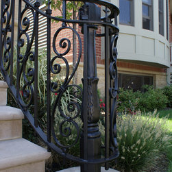 Solid stone stairs with ornamental iron railing - Products