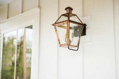 This is an example of a cottage porch design in Atlanta.