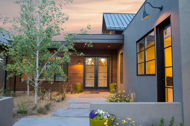 Example of a trendy exterior home design in Other