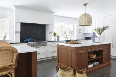 Mid-sized trendy medium tone wood floor and gray floor kitchen photo in Toronto with two islands
