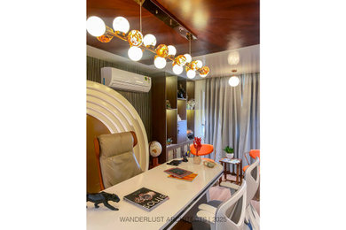 Example of a minimalist home office design in Other