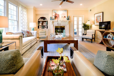 Example of a large trendy formal and enclosed carpeted living room design in Other with yellow walls, a standard fireplace, a tile fireplace and no tv