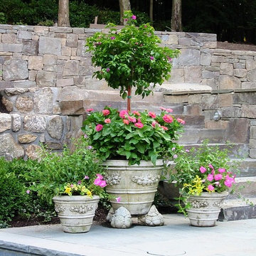 Pool Stone Hearth and Surrounding Gardens