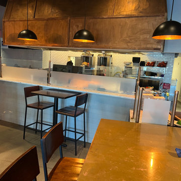 Frosted Glass Partitions with Copper Pipe Detailing – Zo Greek Restaurant