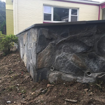 Irregular Flagstone Patioin Silver Spring MD With Stone Sitting Walls