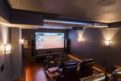 Example of a transitional home theater design in Minneapolis