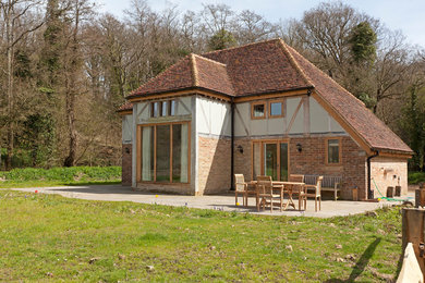 Photo of a country home design in Sussex.