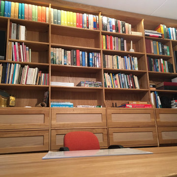 Study room - with bespoke wall covering bookcloset and desk in oak