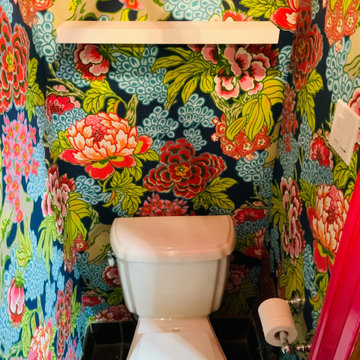 Dramatic and colouful wallpaper powder room
