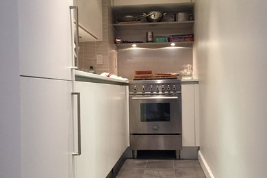 Example of a transitional kitchen design in New York