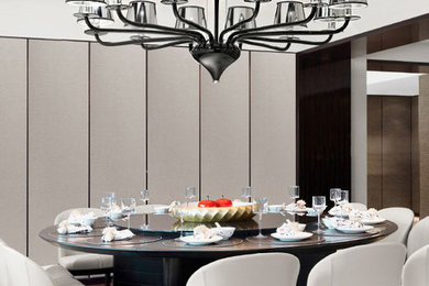 Kitchen/dining room combo - large modern dark wood floor and brown floor kitchen/dining room combo idea in New York with no fireplace and beige walls