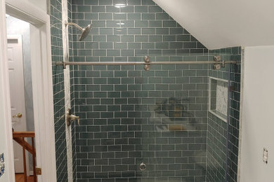 Bathroom - mid-sized master glass tile mosaic tile floor bathroom idea in Baltimore with a niche
