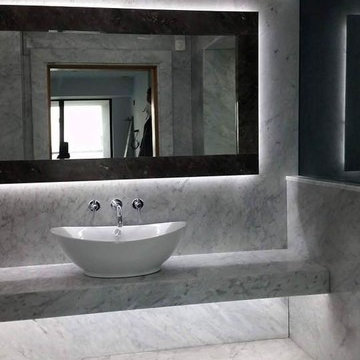 Carrara marble bathroom by ADL Tile and Stone