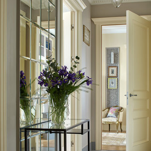 Idéer för vintage hallar, med grå väggar och blått golv