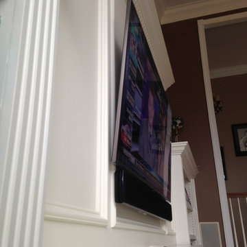 Mount HDTV above Fireplace