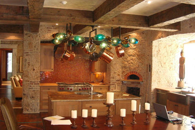 Huge mountain style galley dark wood floor and brown floor eat-in kitchen photo in Denver with a farmhouse sink, shaker cabinets, light wood cabinets, granite countertops, red backsplash, porcelain backsplash, stainless steel appliances, an island and beige countertops