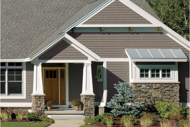 Beige one-story metal exterior home photo in Other