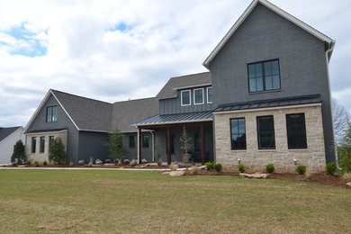 Example of an island style exterior home design in Other