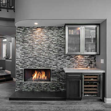 Contemporary fireplace and small bar