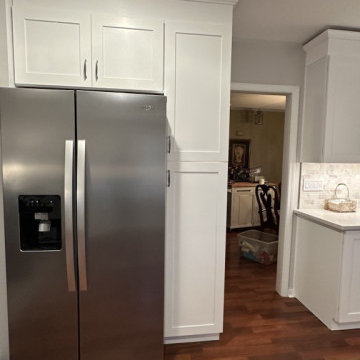 Contemporary Kitchen Remodel Done in New Polar White Cabinets