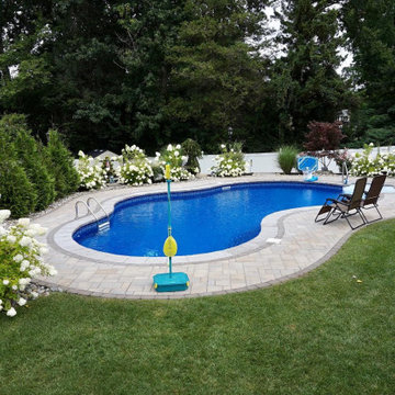 Manalapan, NJ: Freeform Pool Installation with Hydrangea Rock Garden & Seating