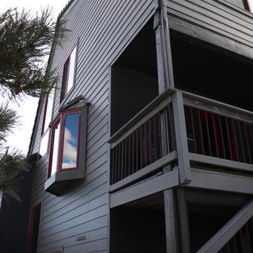 Dark Exterior Remodel | James Hardie Siding with Stone Accents