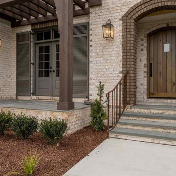 Elegant 5-Bedroom Tudor House Plan with Open Layout - San Antonio, TX