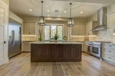 Photo of an expansive arts and crafts kitchen in Sacramento.